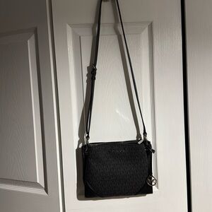 Michael Kors small Crossbody bag w/wallet/card holder. $125 
Like new used twice